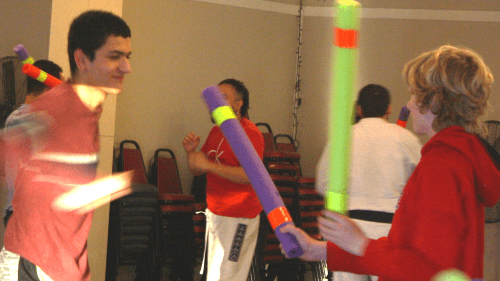 teens kickboxing class with partners